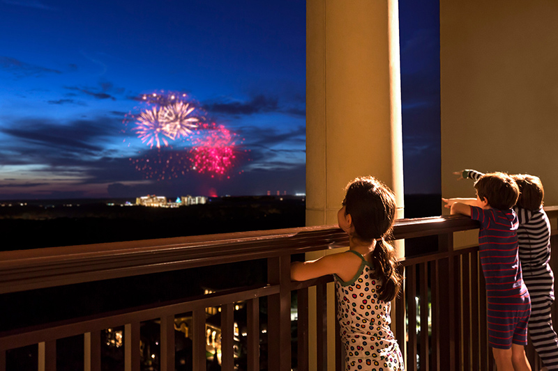 Children watching fireworks over Disneyworld at the Four Seasons Orlando