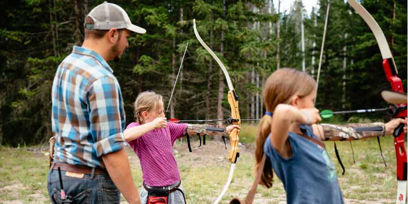 children learning archery