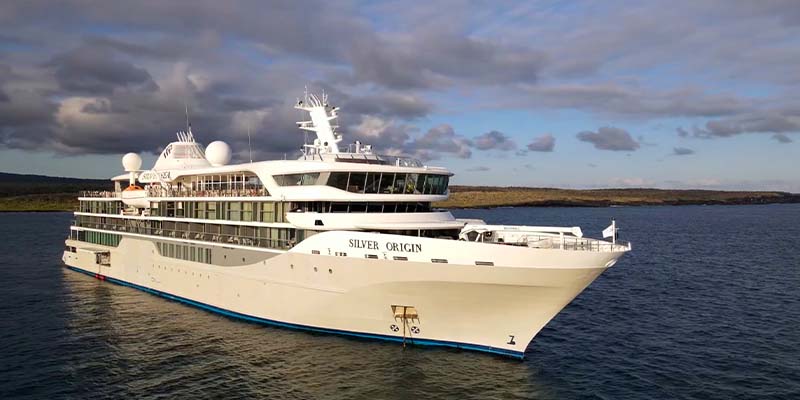 Full view of the Silver Origin cruise ship in the water