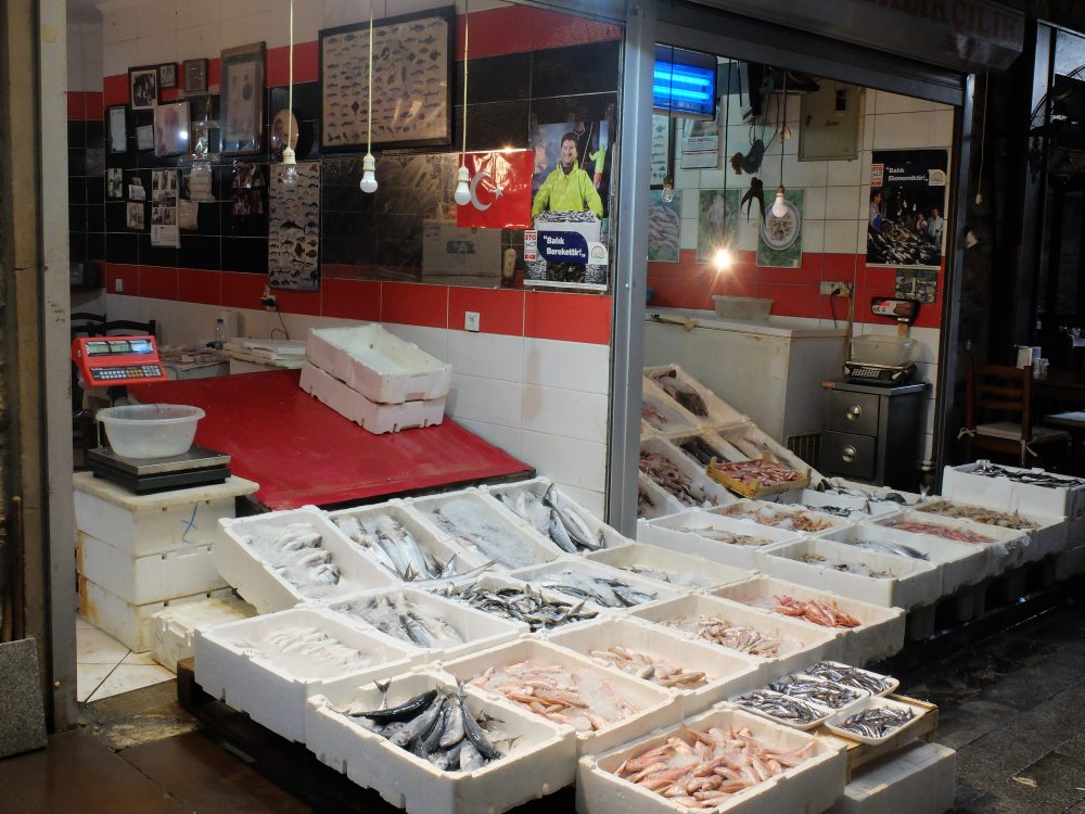 Choosing fresh fish at the market