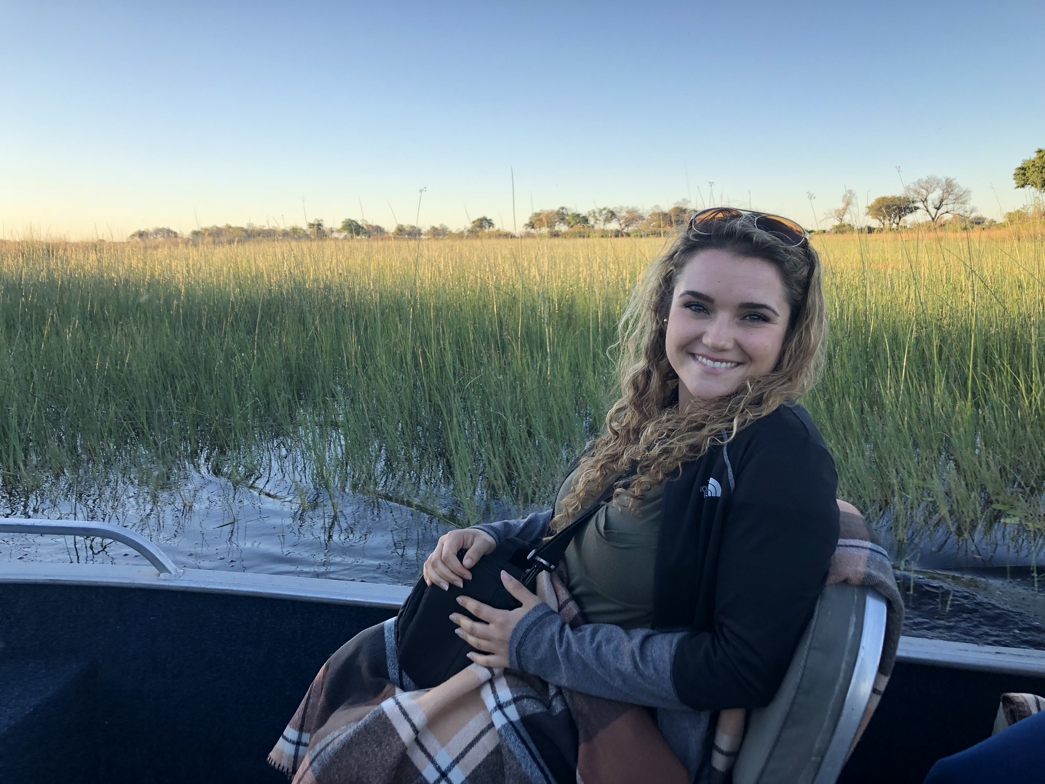 Anna on a boat trip down the delta