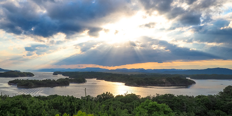 A landscape view over Ago Bay and surrounding greenery