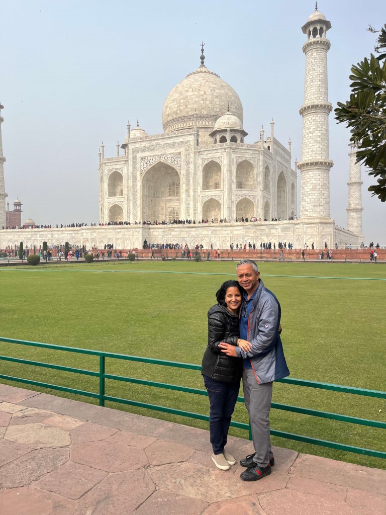 Ratna and her husband in front of the Taj Mahal in Agra, India
