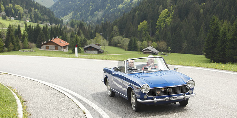  A couple driving through the mountains