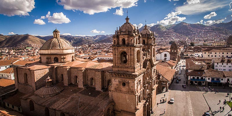 Aerial view of cathedral in square in Cusco