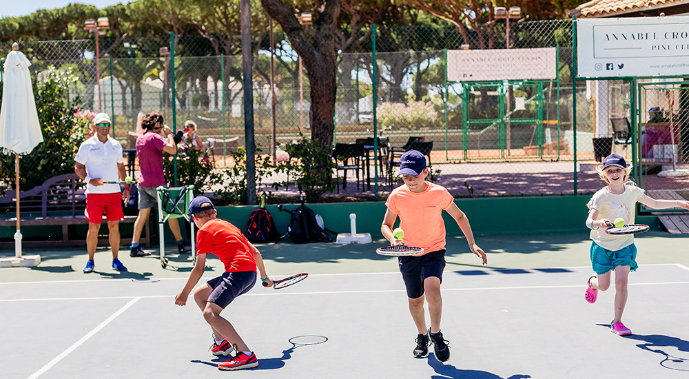 Children playing tennis at Pine Cliffs