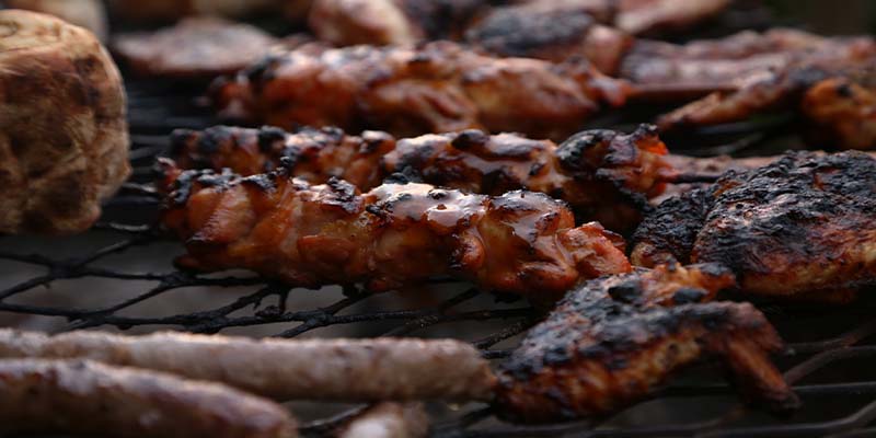 Meat skewers on a grill