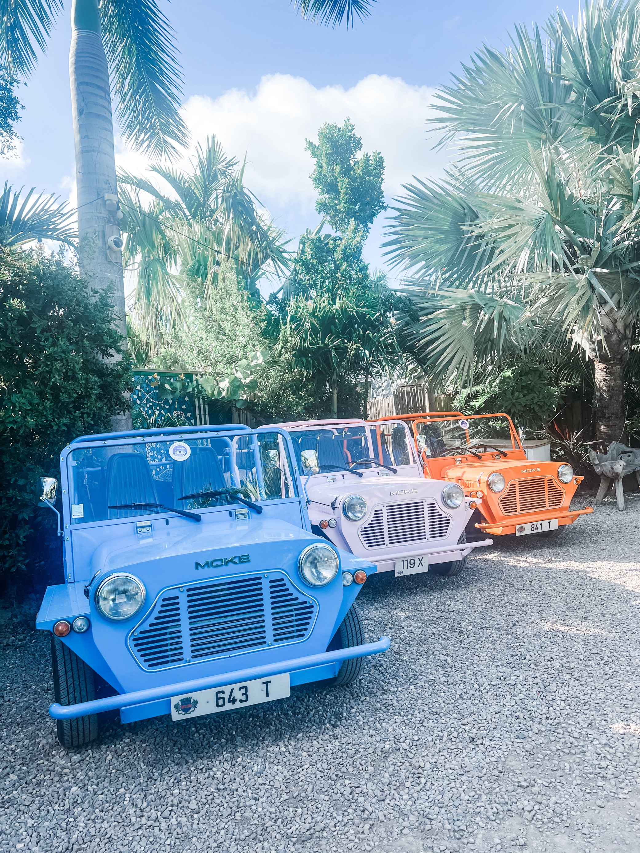 A row of colorful jeeps in St. Barths