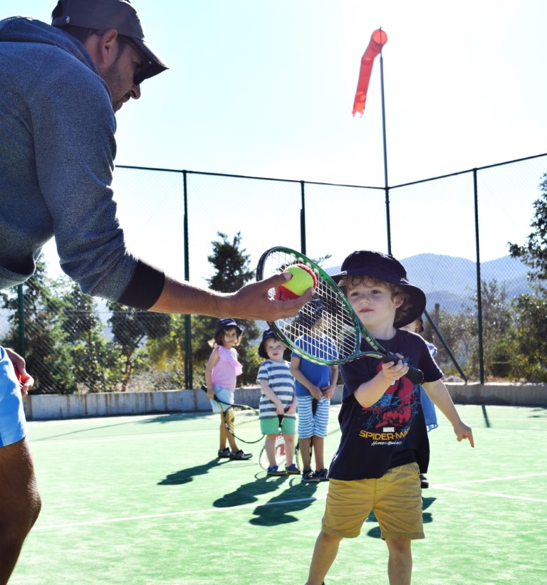 Scott Dunn Explorers kid at tennis lessons