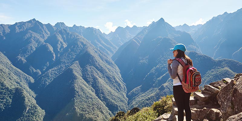 Hiker looking at the mountains