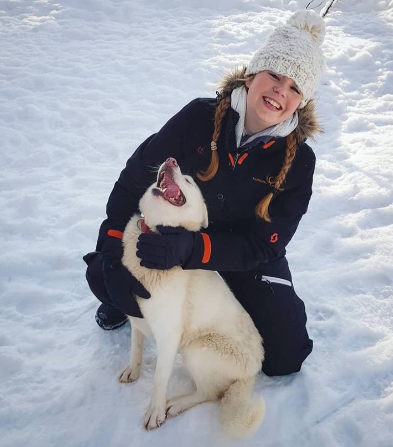 Hannah with the huskies
