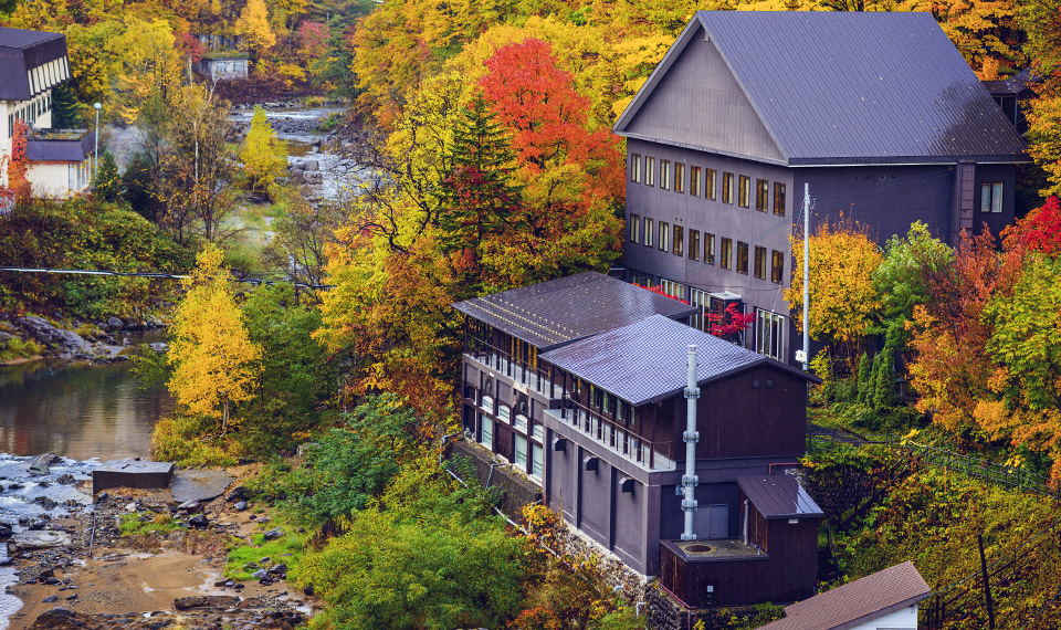Elevated view of the Jozankei hotel on the river