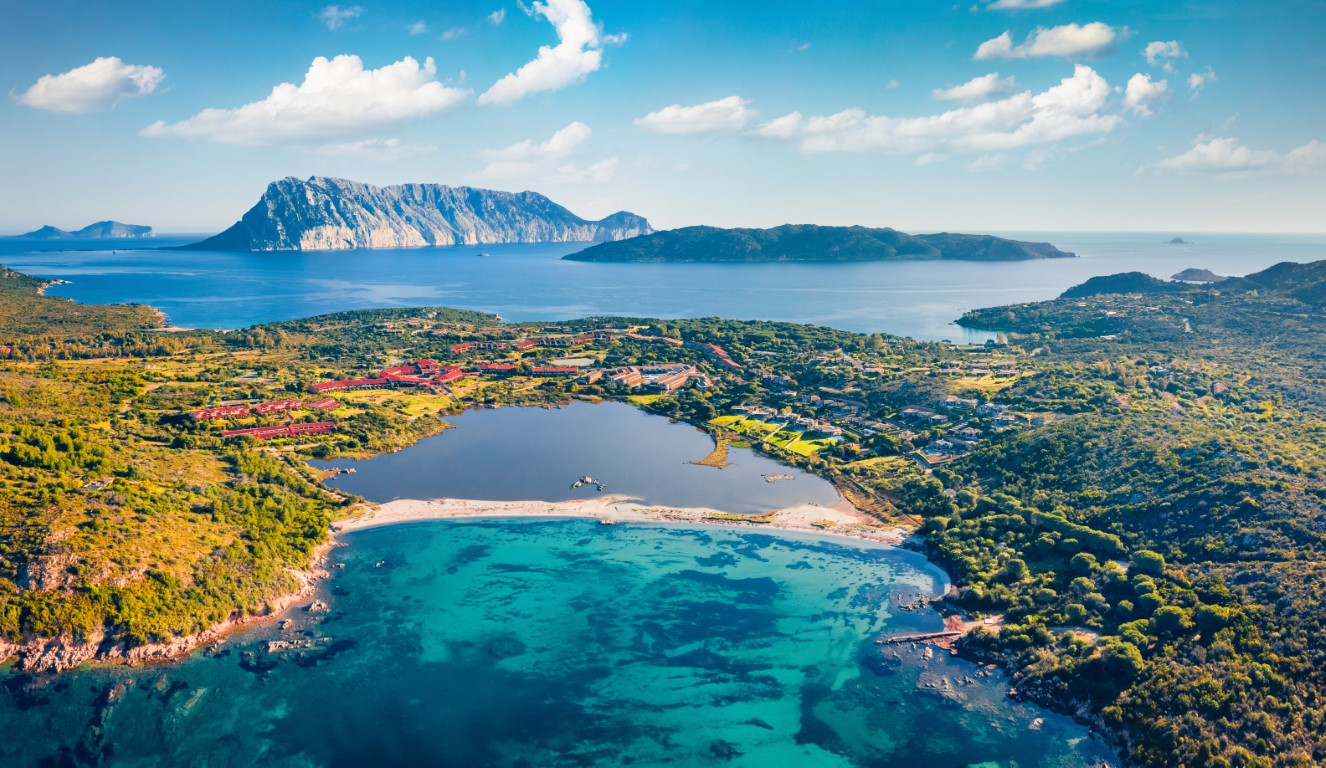 Salina beach with Tavolara mountain in the background in Sardinia, Italy