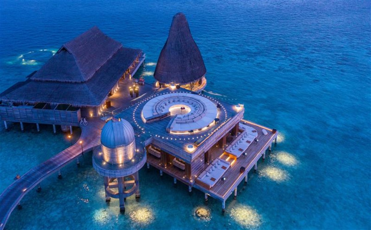 Aerial view of the overwater dining complex at Anantara Kihvah