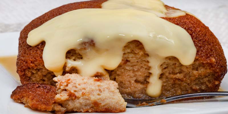 Malva pudding with a spoon