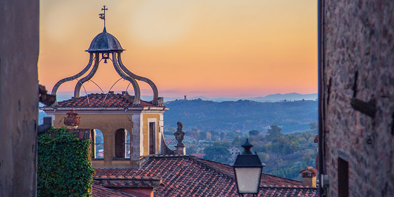 Rooftops with the sun setting in the background