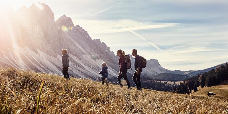 A family hiking in the Dolomites