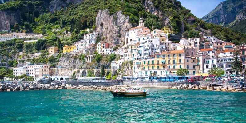 View of the Amalfi coast with a lone boat in the water